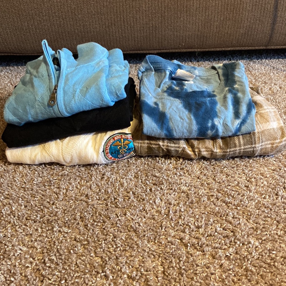 Items from Goodfair: 3 vests, 1 t-shirt, 1 pair of pajama pants